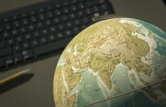 globe on a desktop shows India