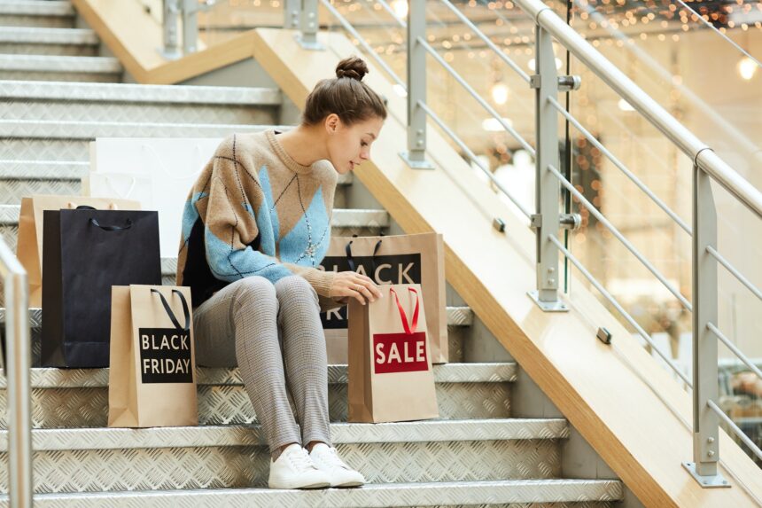 Woman resting after shopping in the mall